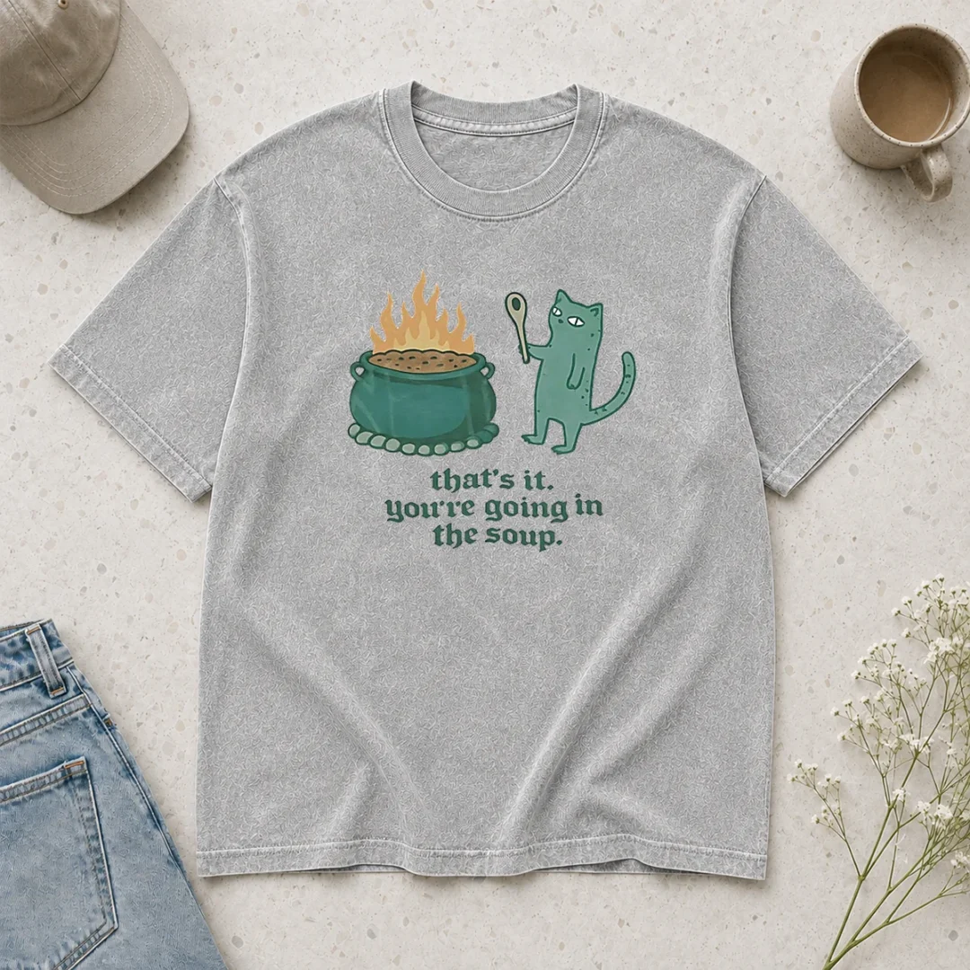 top-happy-cat-holding-spoon-next-to-cauldron-you-re-going-in-the-soup-washed-t-shirt Top Happy Cat Holding Spoon Next To Cauldron You'Re Going In The Soup printed on a soft washed t shirt in light color