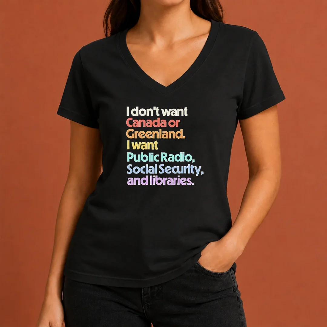 top-official-i-don-t-want-canada-or-greenland-i-want-public-radio-social-security-and-libraries-v-neck-shirt Top Official I Don'T Want Canada Or Greenland I Want Public Radio Social Security And Libraries V Neck Shirt in black, soft fabric, displayed on a mannequin