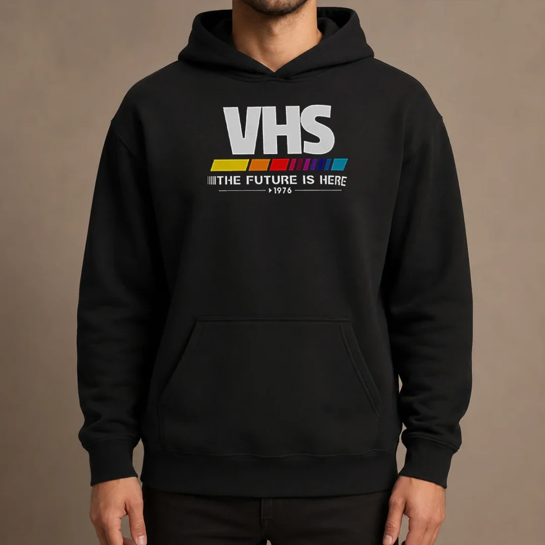 top-pretty-vhs-the-future-is-here-hoodie Top Pretty VHS The Future Is Here Hoodie in black, featuring a retro VHS tape graphic on the front