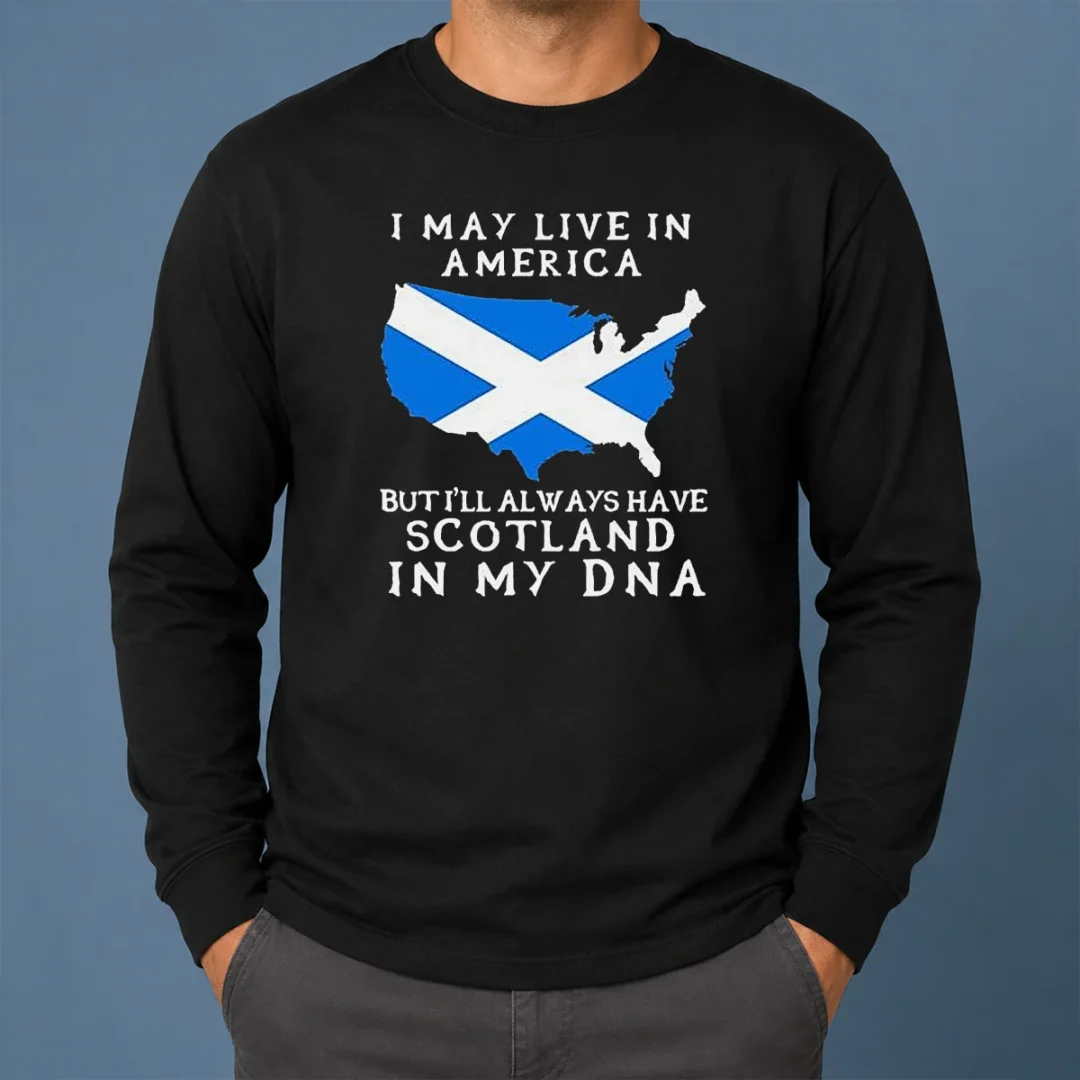 Top Scottish Heritage Apparel I May Live In America But I Will Always Have Scotland In My DNA Long Sleeve Shirt Top Scottish Heritage Apparel I May Live In America But I Will Always Have Scotland In My DNA long sleeve shirt in dark color with bold white text