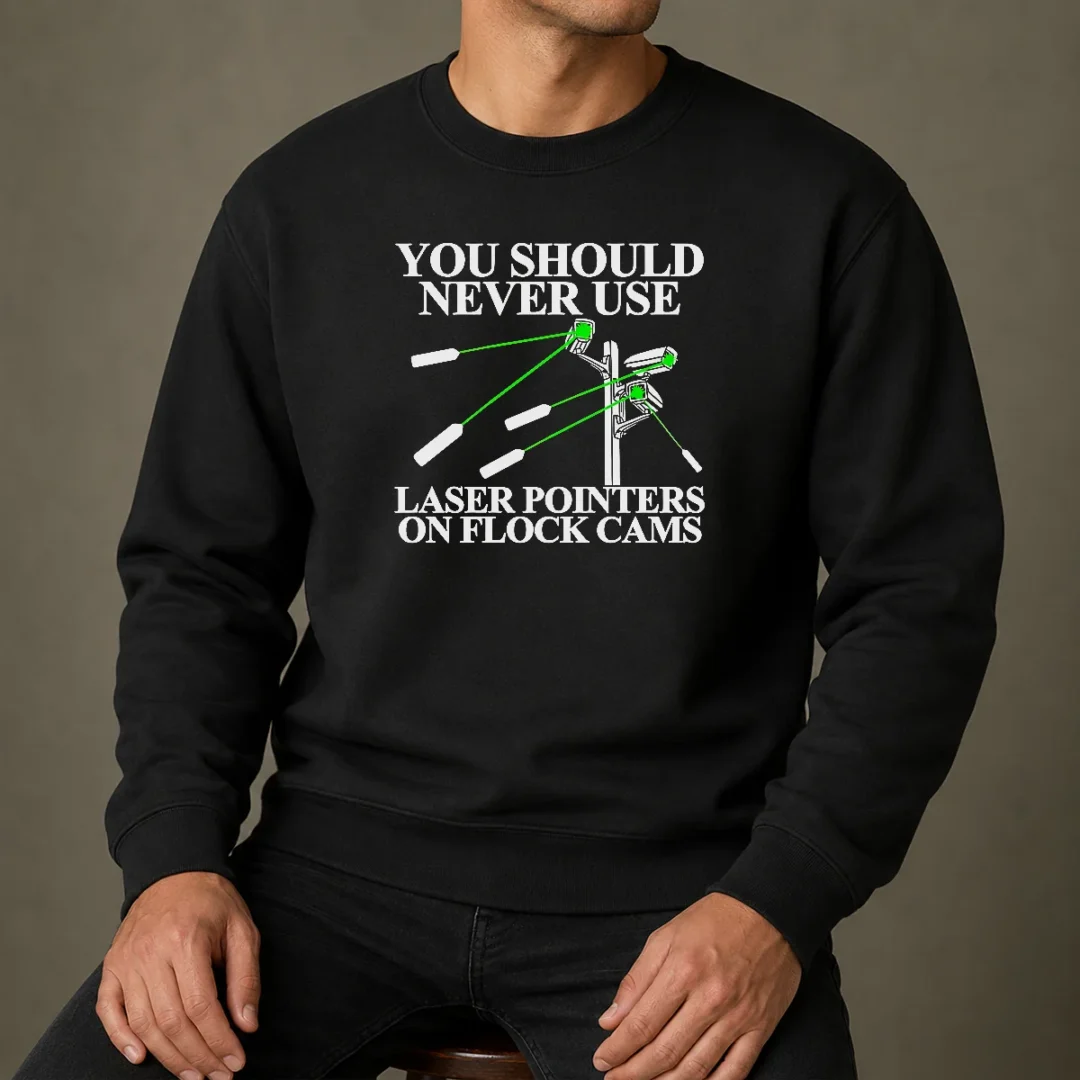 top-you-should-never-use-laser-pointers-on-flock-cams-surveillance-sweater Top You Should Never Use Laser Pointers On Flock Cams Surveillance sweater in charcoal gray with bold white text design on front