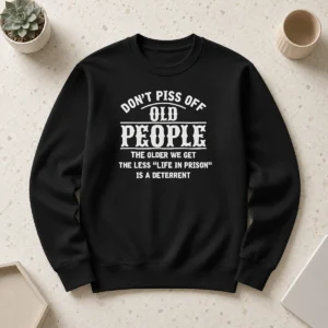 Hot Awesome Don'T Piss Off Old People Life In Prison Deterrent sweater in dark gray with bold white and red text