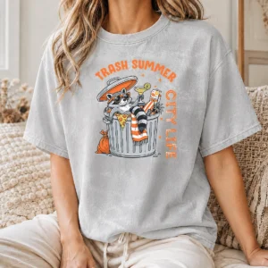 Happy Top Trash Summer City Life Raccoon printed on a comfortable washed t shirt in light gray