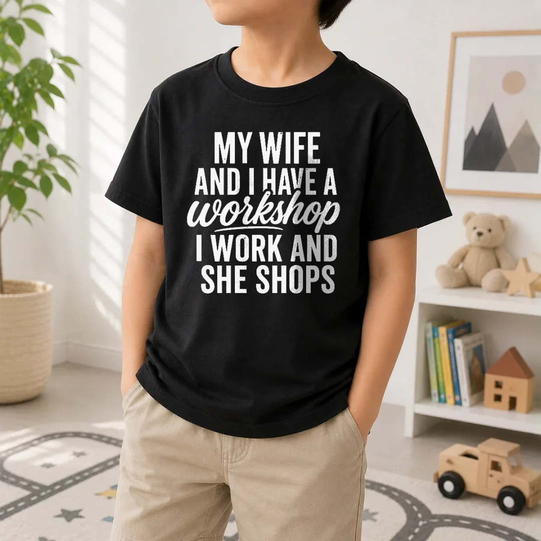 premium-top-couple-workshop-my-wife-shops-i-work-kids-t-shirt-kid-t-shirt Premium Top Couple Workshop My Wife Shops I Work Kids T-Shirt