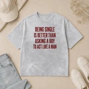 Funny Being Single Is Better Than Asking A Boy To Act Like A Man Quote printed on a soft washed t shirt in light grey